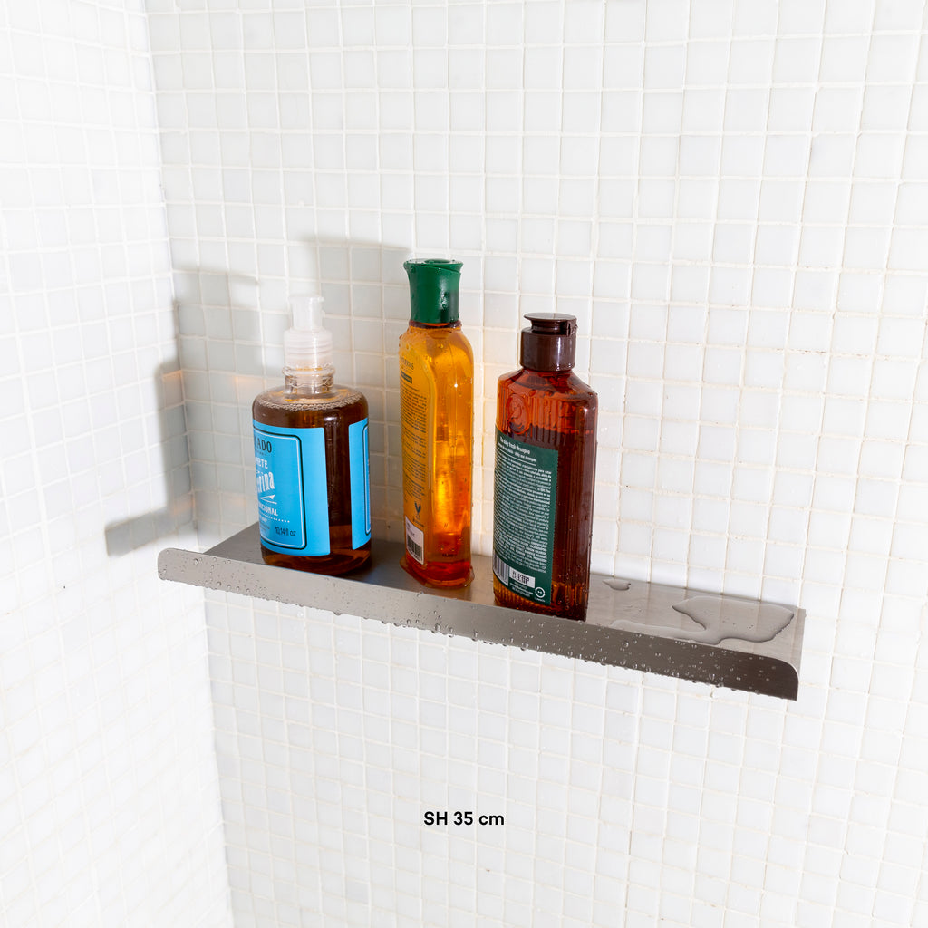 Prateleira inox 35cm em box de banheiro com shampoo